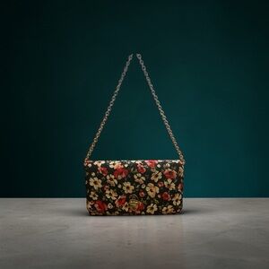 Dolce & Gabbana Black Floral Clutch with Gold Chain in Excellent Condition